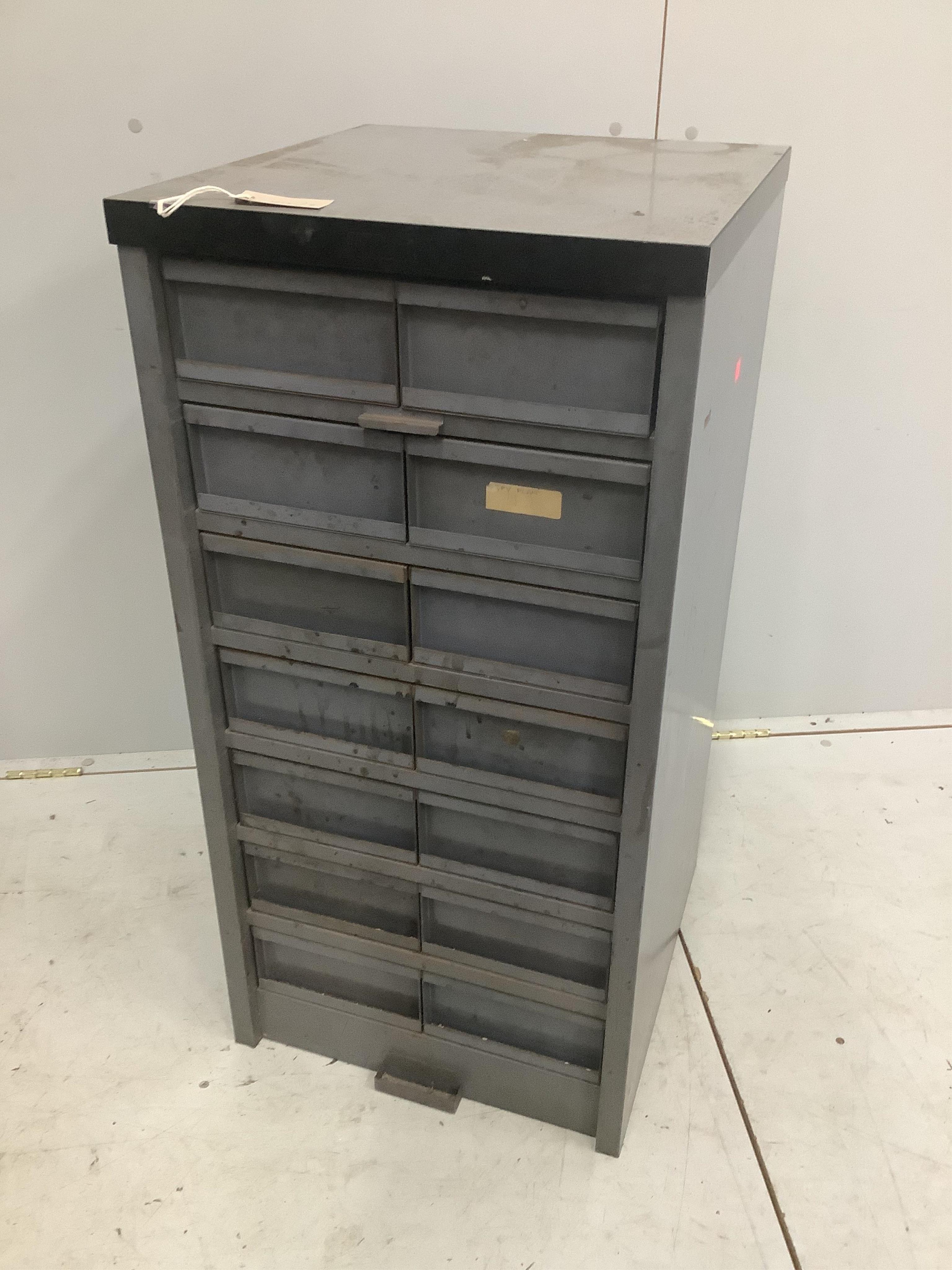 An industrial metal fourteen drawer tall chest, width 45cm, depth 48cm, height 92cm. Condition - fair